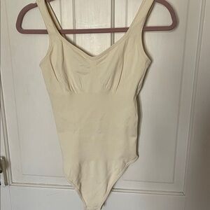 Seamless Shaping Bodysuit in Cream — Sculpting Support